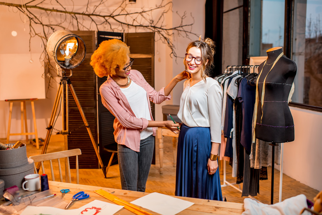 Tailor Measuring Woman Client